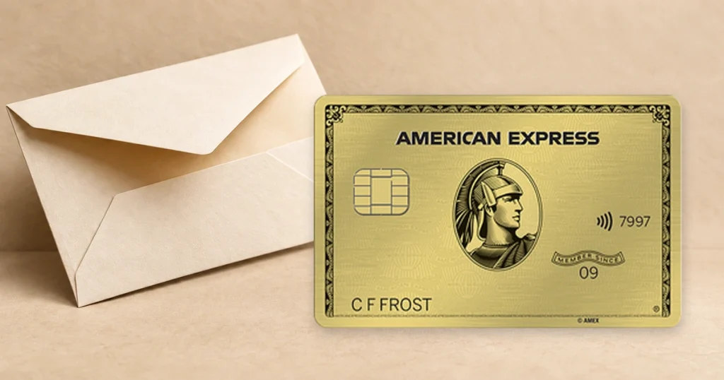 American Express Gold Card beside a cream renewal envelope.